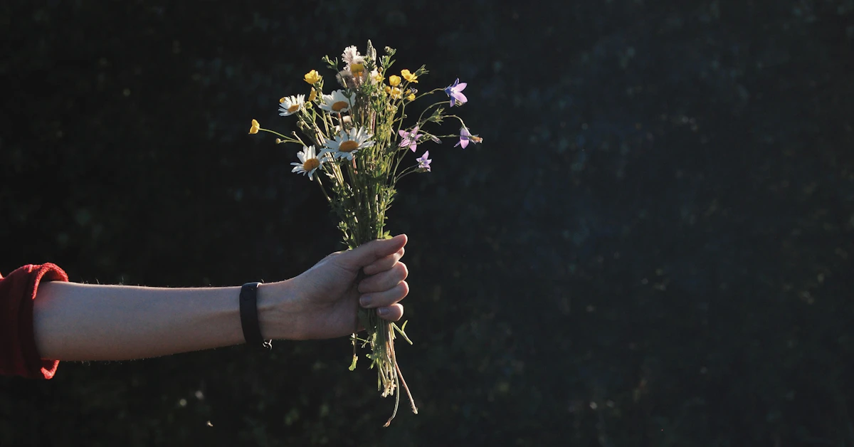 a person holding flowers