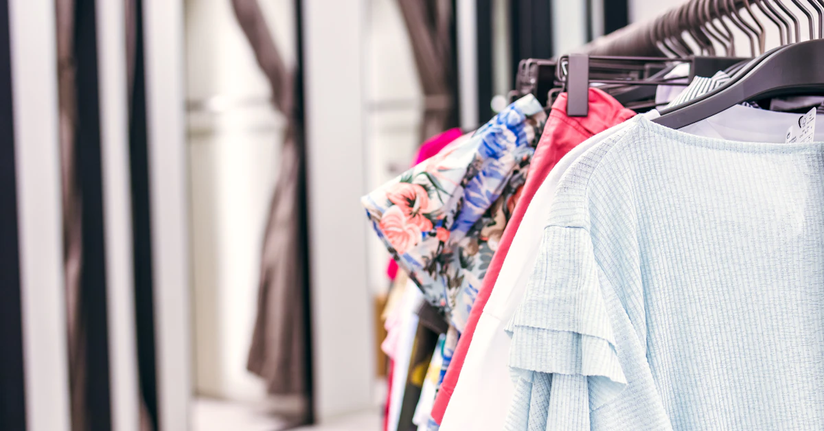 assorted-colored clothes on hangers